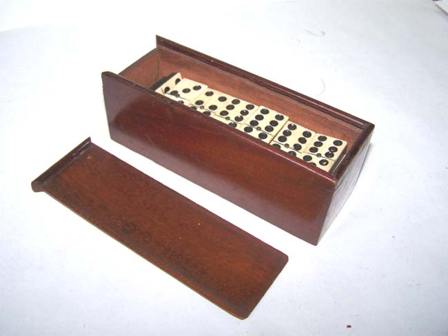 A Nice Set of 19th century Bone and Ebony Dominoes in its' original mahogany box
